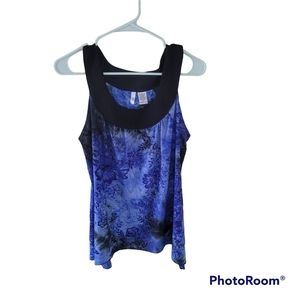 Sam Jo Black and blue blouse with a scooped neck line.  Size medium.